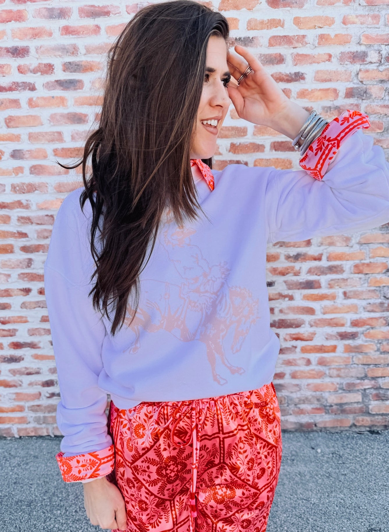 Bucking Cowboy Long Sleeve Sweatshirt